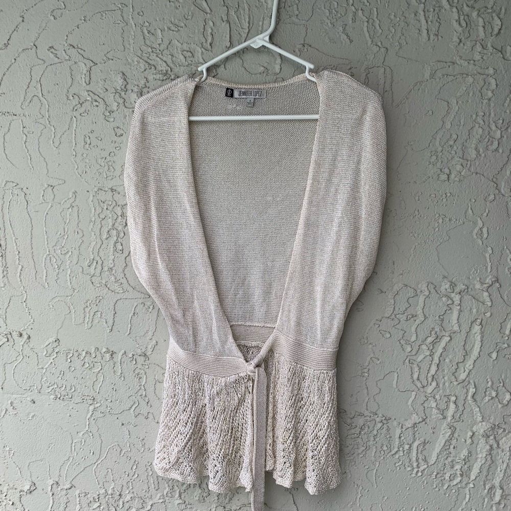 Jennifer Lopez front tie sweater.